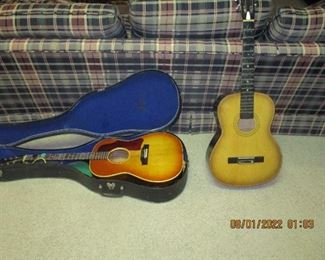 Two acoustic guitars - one Trump and one Gibson  LG1 (probably around 1953 )