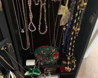 LOTS of costume jewelry and some gold and silver pieces also.