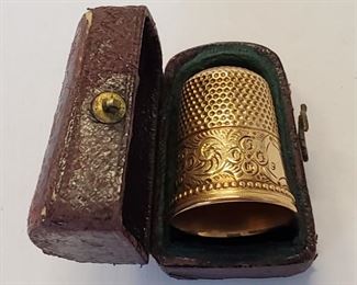 Antique gold thimble with case