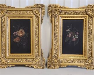 Pair 19th Century Oil on Masonite Floral Paintings. 10" x 6" in ornate 17 1/2" x 13 1/2" frames. Frames have minor restoration.