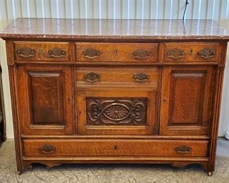 Oak marble top sideboard