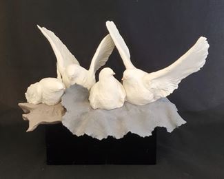 Rare Lladro Nesting Doves Figurine #32/300. Limited edition (#32 of 100) Lladro porcelain figurine entitled "Nesting Doves", by Enrique Sanisidro, 1988-1991. It is 7" tall and 12 1/2" wide. It has its original black painted base, which has some light edge wear and scratches. Figurine has no chips. cracks, or restorations.