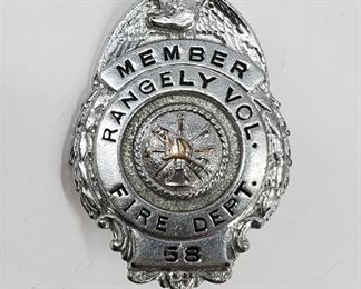 Vintage badge for the Rangely Colorado Volunteer Fire Department