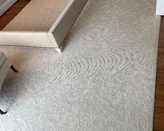 Large white area rug, approximately 13’ x 11’