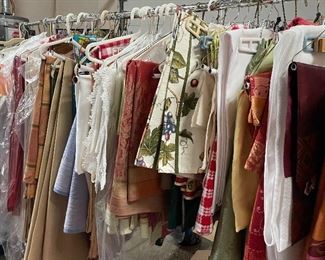 A nice selection of table cloths & runners. Every color, holiday themed