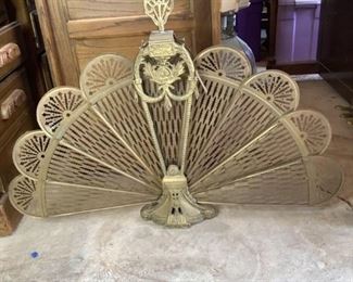 One (1) vintage brass folding peacock fan fireplace guard, H27" x W36 1/2" x D3 1/2" fully expanded, Dirty from storage and some parts appear to be slightly curved.