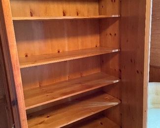 Inside of pine cabinet