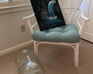 Rattan chair & huge glass piggy bank