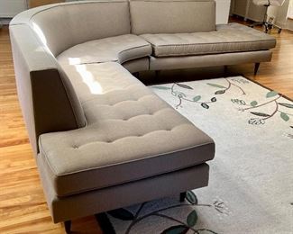 Beautiful Room and Board Reese Modern Curved Sectional in a very nice neutral shade of gray. Item is in very good condition with light wear. 

Each end measures about 63" with the center corner about 6'. Currently selling on Roomandboard.com for $5,300.00
