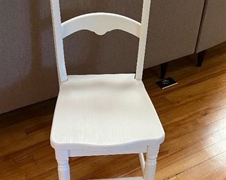 Pottery Barn Finley Wooden Stationary Chair in very good condition. There is a matching soft faux fur cushion that can be attached with ribbons that is included. (not pictured) 