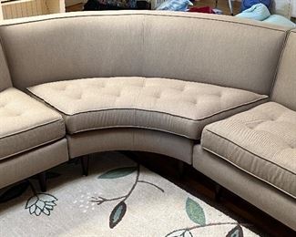 Beautiful Room and Board Reese Modern Curved Sectional in a very nice neutral shade of gray. Item is in very good condition with light wear. 

Each end measures about 63" with the center corner about 6'. Currently selling on Roomandboard.com for $5,300.00
