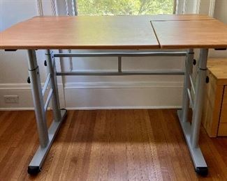 Safco Adjustable Height Split Level Drafting Table or Desk in very good condition. Surface space measuring at 47" x 30". As pictured, the height is 31" and can be adjusted. 