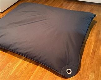 The Original Sitting Bull Bean Bag in a dee charcoal gray color and measuring 53" x 12". In good/used condition. 
