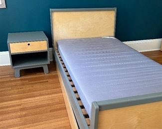 oeuf Sparrow Twin Trundle Bed in good condition with some wear including slight dings on the headboard. The winning bidder can choose to take the quality mattresses if they would like. 

The headboard measures about about 41" long. 

The nightstand measures 19" x 19" x 20" 