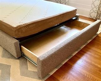 Room and Board Marlo Queen Storage Bed in Tatum (Gray).The Marlo storage bed features a hidden storage drawer that pulls out from the foot of the bed which makes it stylish and functional.  

This bed features a mattress platform made of steel slats, eliminating the need for a box spring or foundation