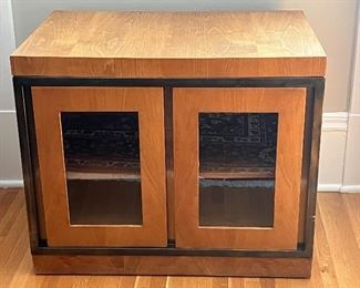 John Widdicomb Double Door Glass Front Accent Table in good condition with light wear to the surface. See lot 20 for an item in the same collection. 

Measures 27" x 18" x 22" 