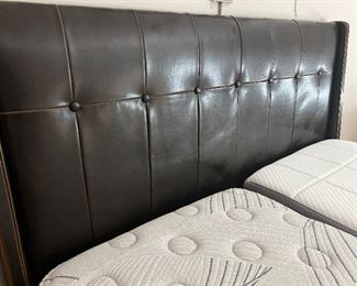 Crate and Barrel Archer King Bed Frame. Inspired by a 40's era Hollywood slipper chair, Archer's marquee-worthy good looks combine clean lines with subtle "wings" on the headboard and a single trim row of button-tufted detailing. Durable leather, with a protective coating, in a deep browns with warm caramel accents at the seams for a more textured, aged look. Tapered wood legs have a cognac finish. Generous, self-welted and seamed raises and footboard make the mattress appear to float. 

The winning bidder can choose to take the quality twin mattresses by "Nectar" and "Idle Sleep"which comes with an adjustable base with remote control access. The adjustable base does not have to be used if that is not your preference. The adjustable individual twin mattresses has an adjustable frame allowing the user to adjust head and feet height. Additionally, it has a massage feature! 