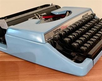 Petite Vintage Brother Charger II Typewriter that measures 12x12x3 inches. 