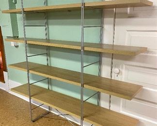 IKEA Enetri Shelving System has so much open space to display your favorite photos, treasures and more! The shelf measures 67x63x13 inches. Comes with original assembly instructions. 