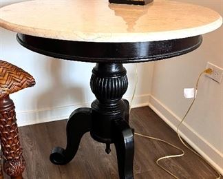 I of 2 Matching Mahogany 36" base tables with marble top from the West Indies purchased in Naples Florida