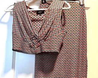 a.b.s ladies skirt and matching top - size P- there is more clothes than what is shown in these pictures