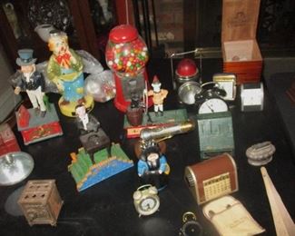 Collection of still and mechanical banks, bubble gum machine and other collectibles
