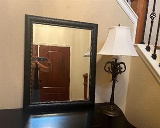 Decorative mirror and lamp.