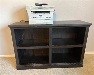 black bookcase.    Brother printer sold separately