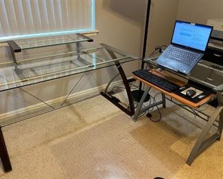 2 computer desks, glass tops.