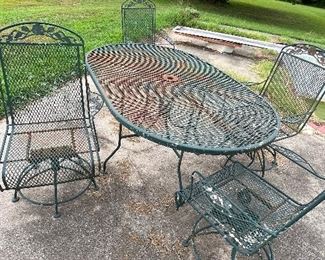 Oval metal table and chairs $250
