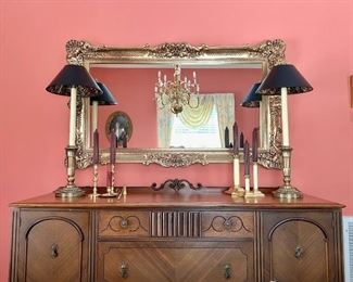Beautiful gold mirror and Robert Abbey buffet lamps