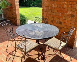 Outdoor Patio Table & 4 Chairs (one chair is missing the base cushion)