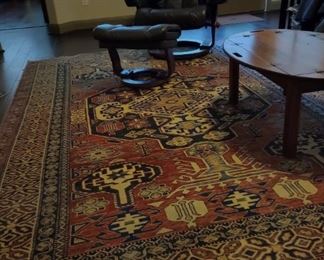 Authentic Turkish hand woven rugs and leather chair with ottoman