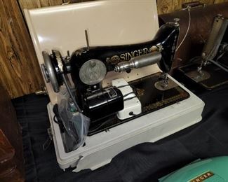 vintage Singer sewing machines and supplies