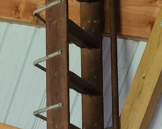 Vintage phone company ladder closeup