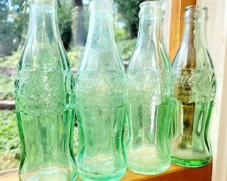 Coke Cola bottle,  different city manufacturer 