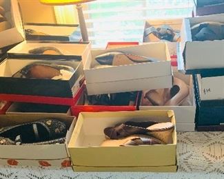 Over a 150 pairs of new in the boxes ladies shoes and boots. Around a size 7 1/2