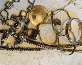 Trays of costume jewelry including sterling bangles and necklaces
