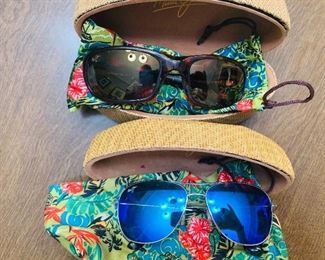 Designer sunglasses including Maui Jim. 