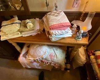 Side table holding linens