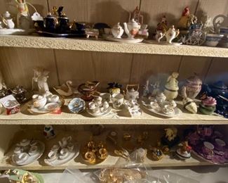 Some of the many miniature tea sets.