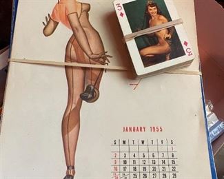 Pin-up calendar from 1955 and Lone Wolf nudie cards.