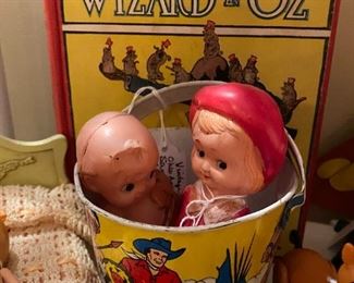 Old Frank Baum Wizard of Oz book, sand pail and celluloid dolls
