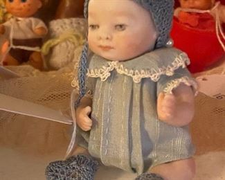 Sweet tiny toddler doll.