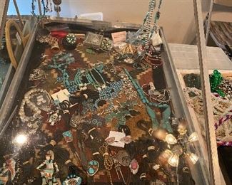 Native American silver and turquoise jewelry...bolos, squashes, necklaces and more