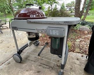 Weber Performance Charcoal Grill w gas starter and charcoal storage bin ~ $350