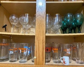 Lots of Hooters glasses, other collectible character glassware sets