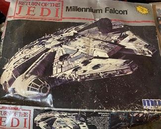 1989 Millenium Falcon model, mostly put together (next photo). Not sure if all pieces are there. 