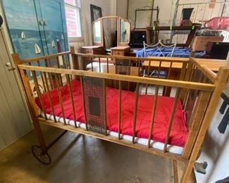 Vintage crib with wheels - great for a doll or teddy bear collection display