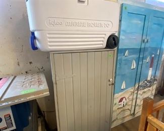 Igloo cooler and cabinet underneath
